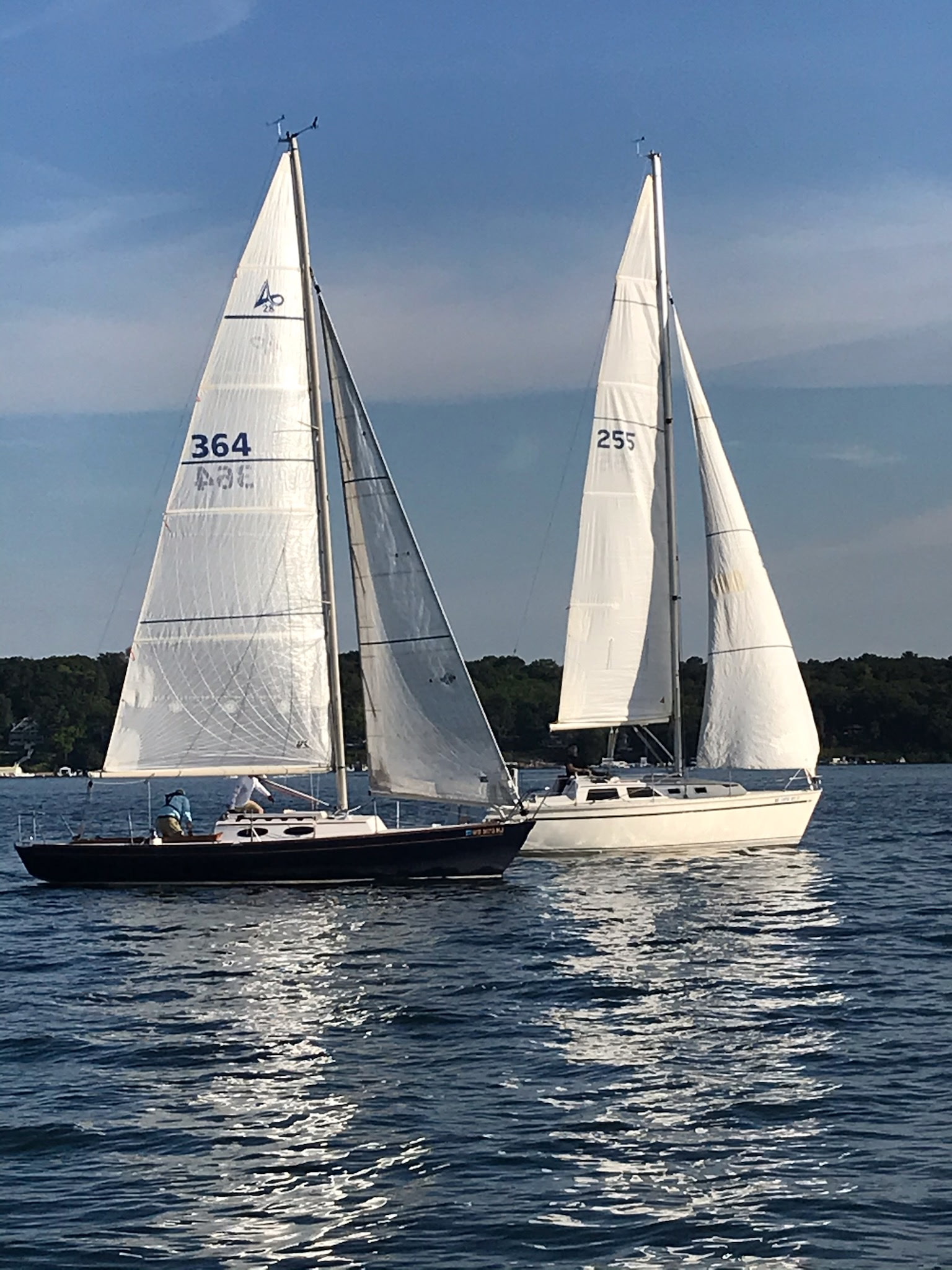 Two GLKC keelboats racing on Geneva Lake